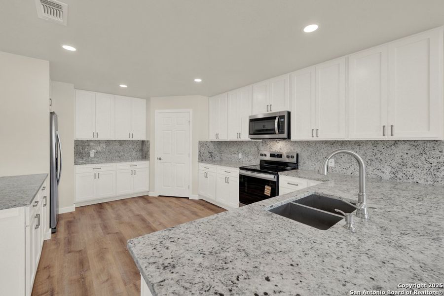Furnished interior view inside a new home in , Canyon Lake (Image 13).