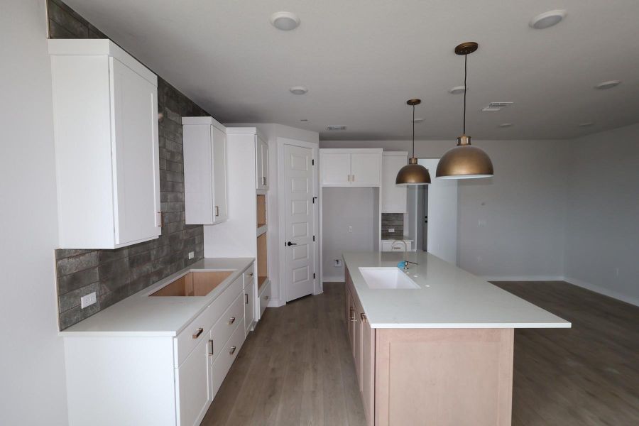 Furnished interior view inside a new home in Terrace Collection At Turner's Crossing, Buda (Image 15).