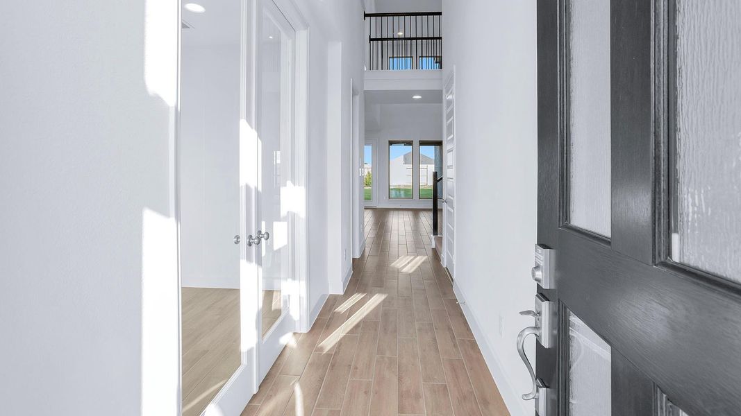 Spacious, unfurnished interior of a new home in Amira 45', Tomball (Image 3). Spacious, unfurnished interior of a new home in Amira 45', Tomball (Image 3).