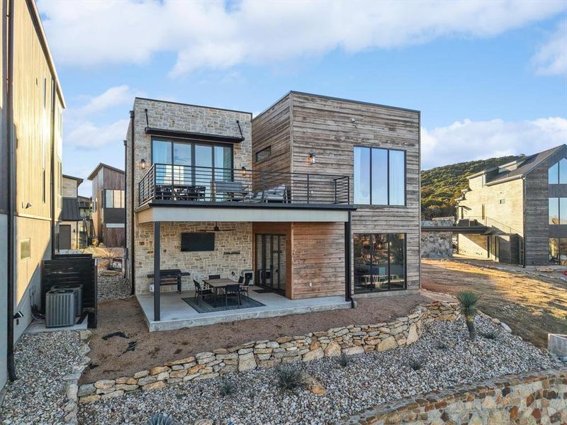 Exterior details and patio area of a home in , Graford (Image 3).