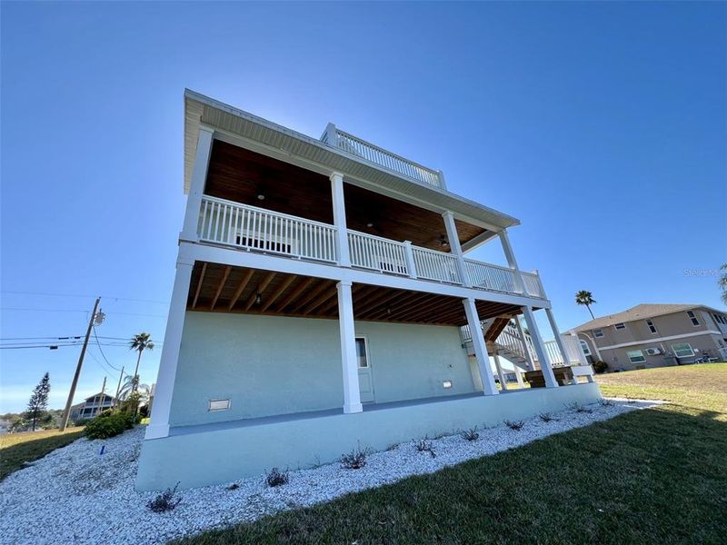 Exterior details and patio area of a home in , Hernando Beach (Image 32).