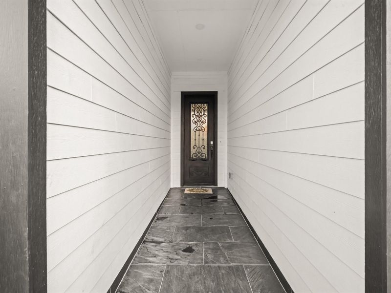 Grand Entry fea. 8 ft. exterior iron door