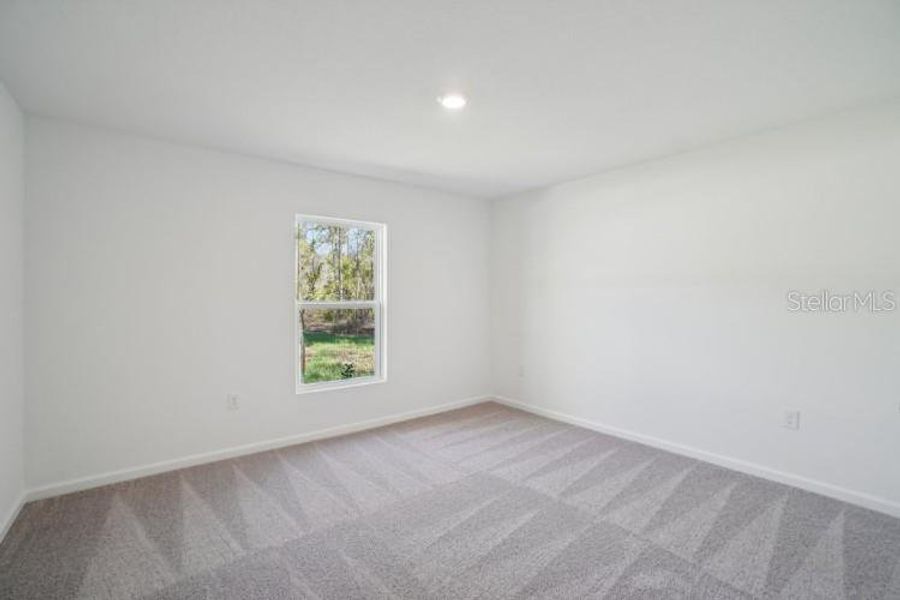 Spacious, unfurnished interior of a new home in Royal Highlands, Weeki Wachee (Image 13).