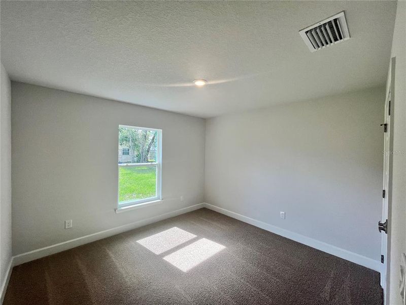 Spacious, unfurnished interior of a new home in Orange Blossom Hills, Summerfield (Image 6).