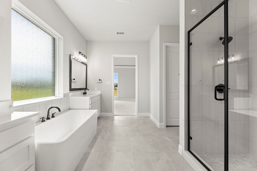 Representative furnished interior of a home built from the Derby by Windsor Homes in Ridge Pointe Estates, McLendon-Chisholm (Image 14).