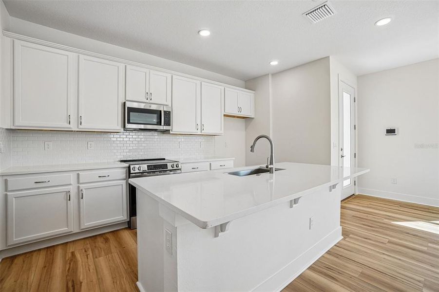 Furnished interior view inside a new home in Lagoon Residences at Epperson, Wesley Chapel (Image 10).