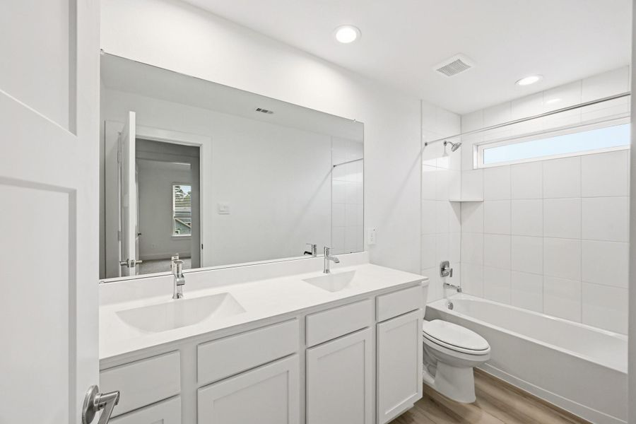 Furnished interior view inside a new home in Hills of Westlake, Conroe (Image 9).