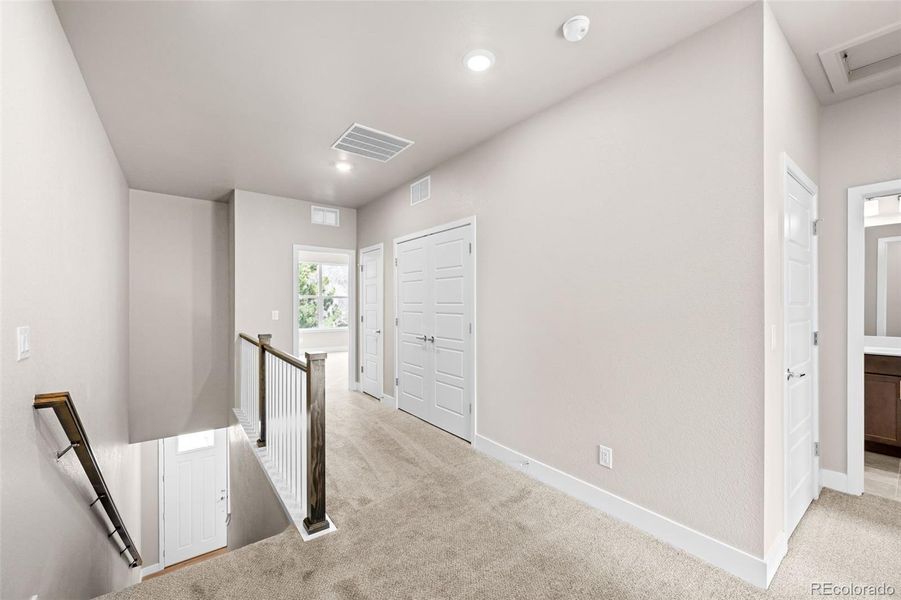 Spacious, unfurnished interior of a new home in Ralston Creek, Arvada (Image 28).