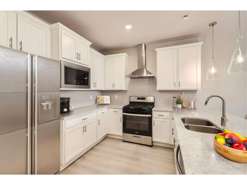 Furnished interior view inside a new home in Mountain Brook, Longmont (Image 17).