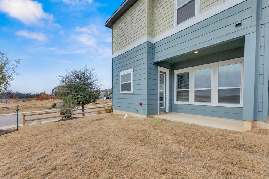Exterior details and patio area of a home in The Poppy at Vista Vera, Georgetown (Image 2).