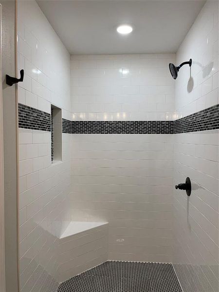 Bathroom with tiled shower