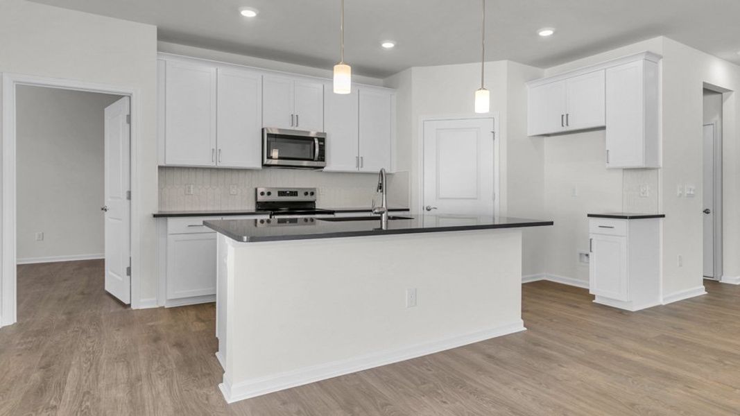Representative furnished interior of a home built from the CLIFTON by D.R. Horton in The Villas at Galvins Ridge, Sanford (Image 7). Representative furnished interior of a home built from the CLIFTON by D.R. Horton in The Villas at Galvins Ridge, Sanford (Image 7).