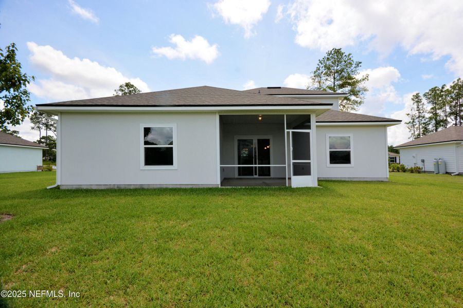 Front exterior of a new home in , Jacksonville, FL, highlighting curb appeal (Image 22).
