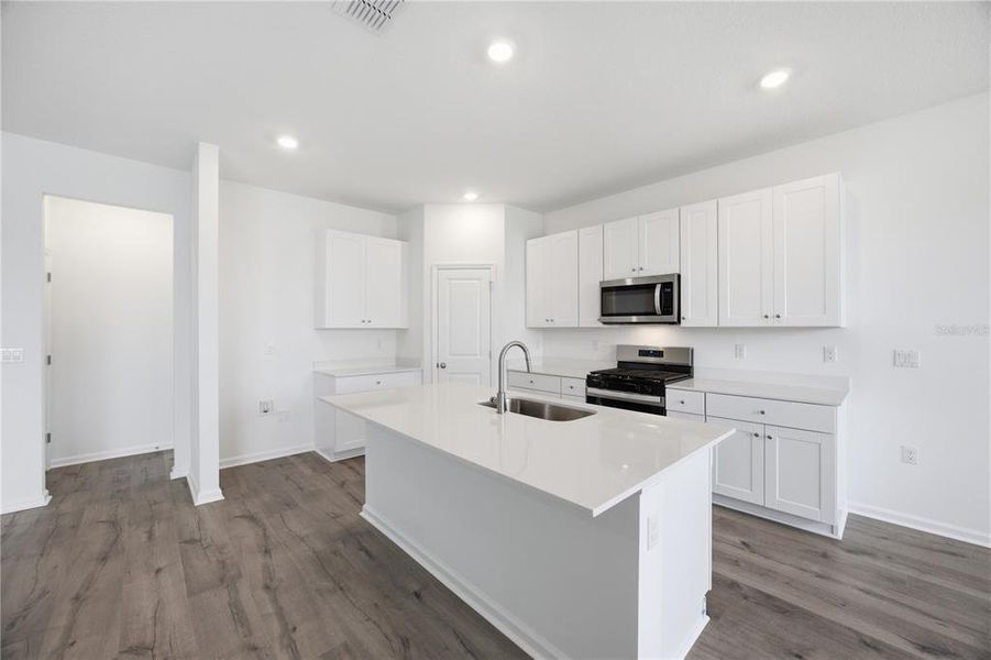 Furnished interior view inside a new home in , Okahumpka (Image 6).