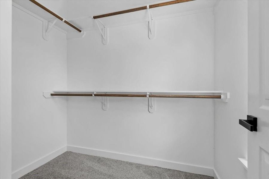 walk-in primary closet walk-in primary closet