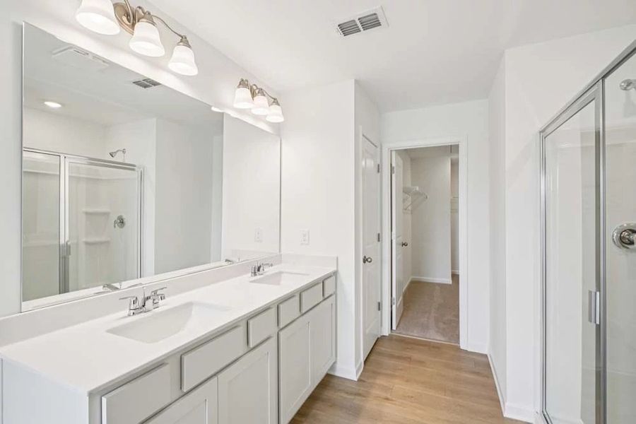 Primary Bathroom featuring Serene Collection Finishes Primary Bathroom featuring Serene Collection Finishes