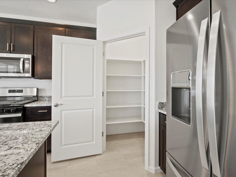 Furnished interior view inside a new home in Las Patrias at Star Valley Phase III - Premier Series, Tucson (Image 4).