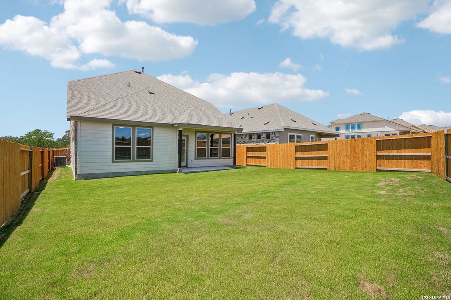 Exterior details and patio area of a home in Meyer Ranch - Enclave, New Braunfels (Image 19).