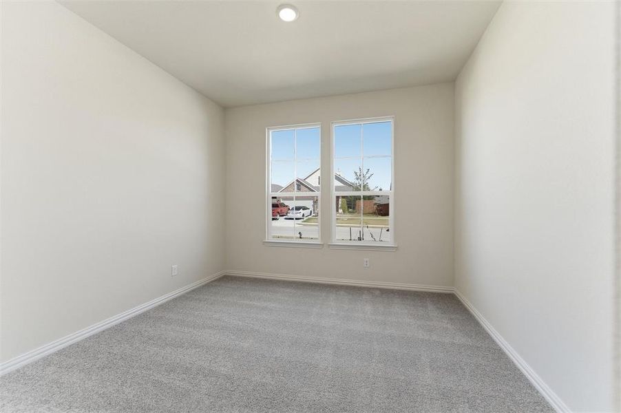 Unfurnished room featuring light colored carpet and recessed lighting