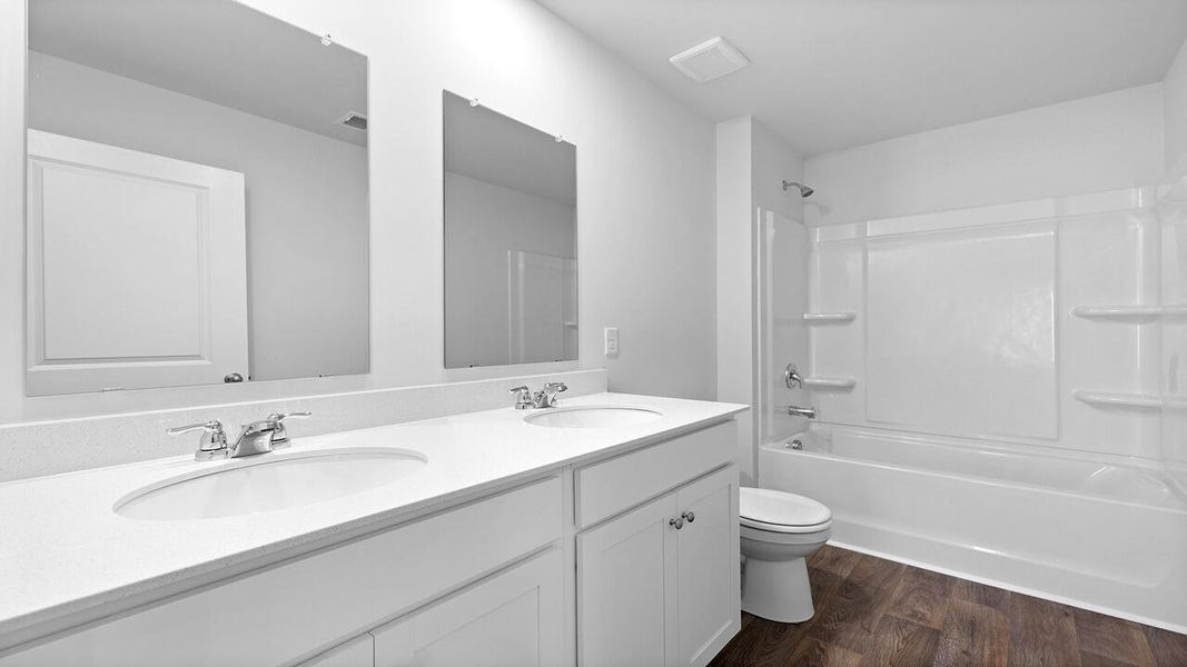 Furnished interior view inside a new home in Pine Hills at Cane Bay, Summerville (Image 4).