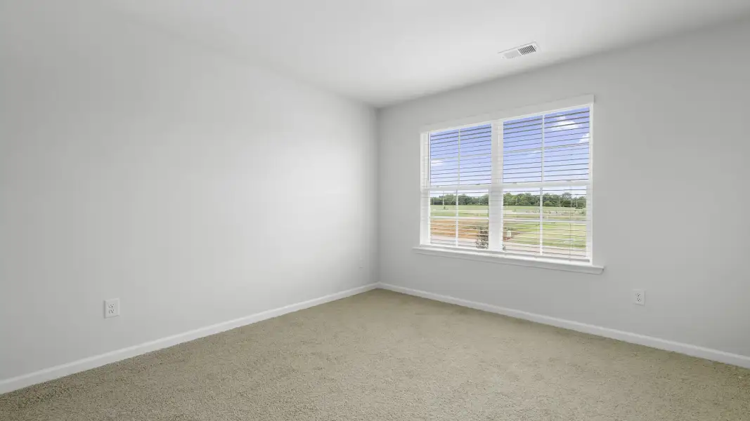 Spacious, unfurnished interior of a new home in Neal Place, Stokesdale (Image 16).
