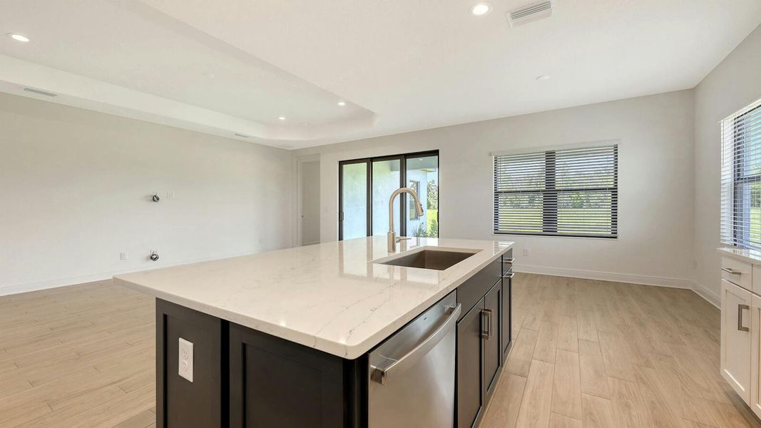 Furnished interior view inside a new home in Palm Grove Real Estate and Homes for Sale in Lakewood Ranch, FL - Neal Communities, Lakewood Ranch (Image 13).