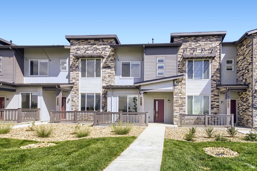 Front exterior of a new home in Riano Ridge, Loveland, CO, highlighting curb appeal (Image 1). Front exterior of a new home in Riano Ridge, Loveland, CO, highlighting curb appeal (Image 1).
