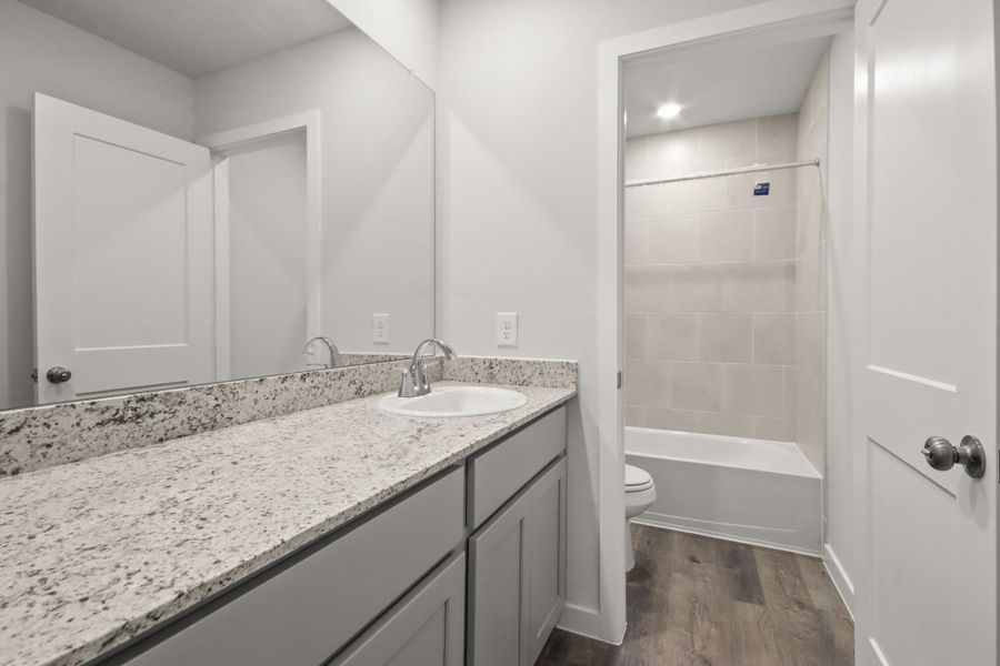 Furnished interior view inside a new home in Lakes at Crockett Martin, Conroe (Image 5).