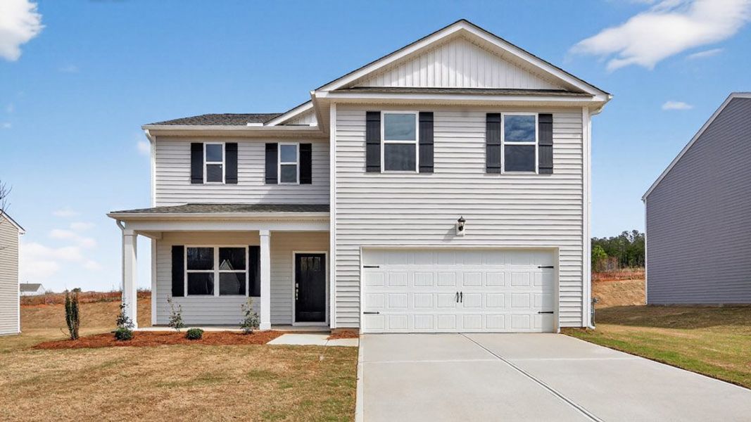 Front exterior of a new home in Swift Creek Farm, Clayton, NC, highlighting curb appeal (Image 1). Front exterior of a new home in Swift Creek Farm, Clayton, NC, highlighting curb appeal (Image 1).