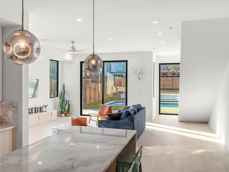 Dining space featuring recessed lighting, a ceiling fan, and light wood-type flooring