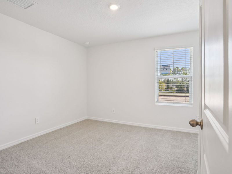 Spacious, unfurnished interior of a new home in The Meadow at Crossprairie Townes, St. Cloud (Image 11).