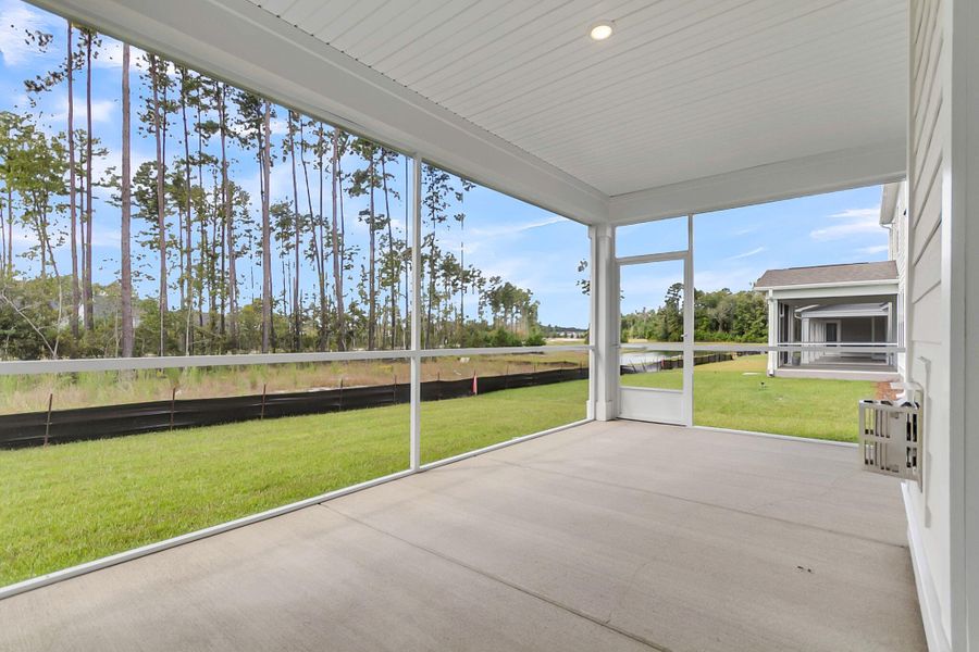 Exterior details and patio area of a home in Tidewater at Lakes of Cane Bay, Summerville (Image 3). Exterior details and patio area of a home in Tidewater at Lakes of Cane Bay, Summerville (Image 3).