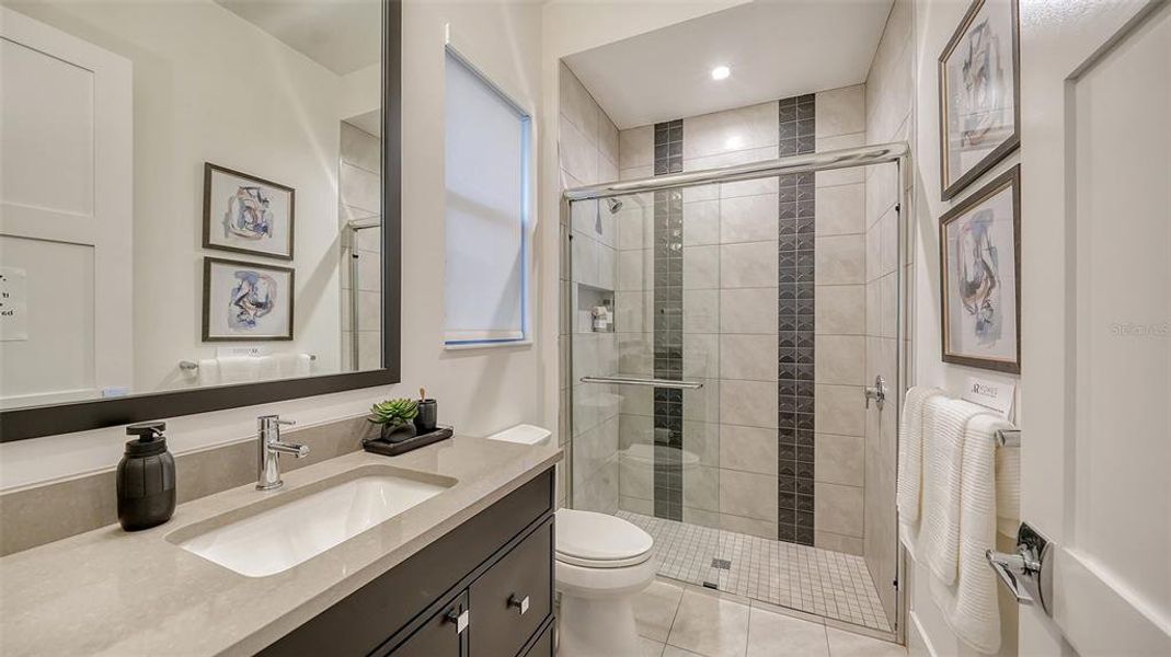 Furnished interior view inside a new home in Wild Blue at Waterside, Sarasota (Image 75).