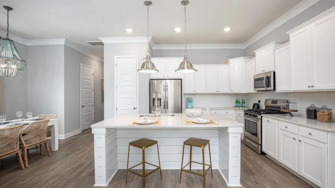 Furnished interior view inside a new home in Heron's Walk at Summers Corner: Row Collection, Summerville (Image 11).