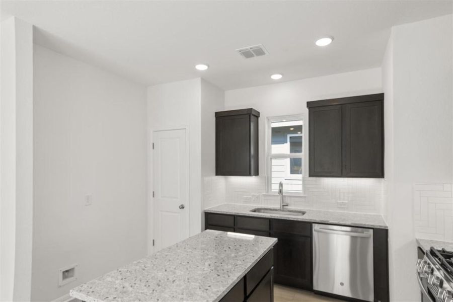 Furnished interior view inside a new home in Trace, San Marcos (Image 9).