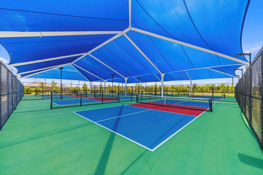 Covered pickleball courts provide year-round play for all skill levels.