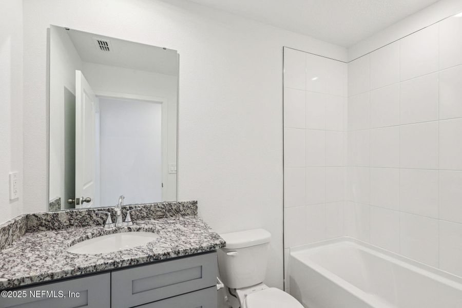 Furnished interior view inside a new home in Azalea Creek, Jacksonville (Image 11).