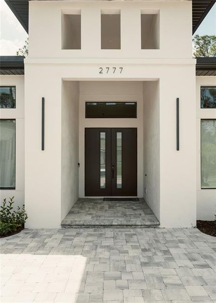Exterior details and patio area of a home in , North Port (Image 36).