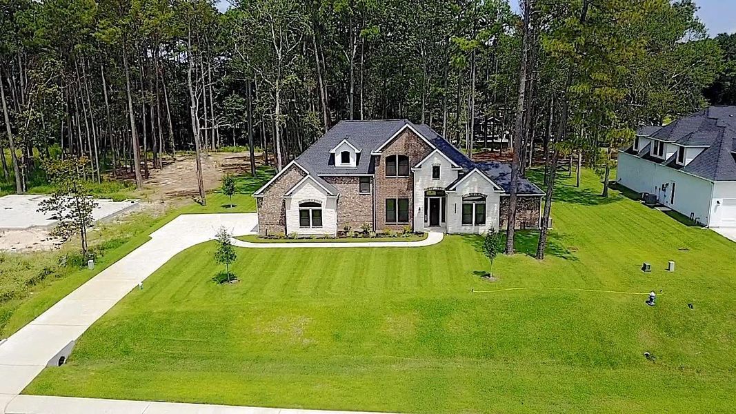 Front exterior of a new home in , Houston, TX, highlighting curb appeal (Image 18). Front exterior of a new home in , Houston, TX, highlighting curb appeal (Image 18).