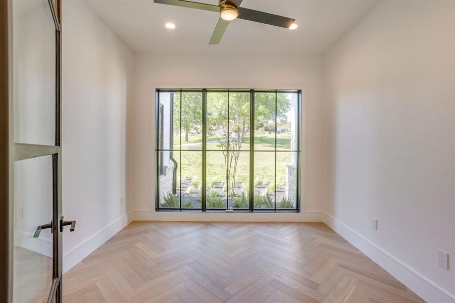 Unfurnished room featuring recessed lighting, parquet flooring, and ceiling fan