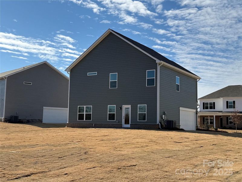 Exterior details and patio area of a home in Cedar Meadows, Monroe (Image 3).