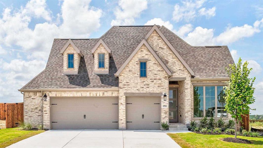 Front exterior of a new home in Talon Hills 60'/70', Fort Worth, TX, highlighting curb appeal (Image 1). Front exterior of a new home in Talon Hills 60'/70', Fort Worth, TX, highlighting curb appeal (Image 1).
