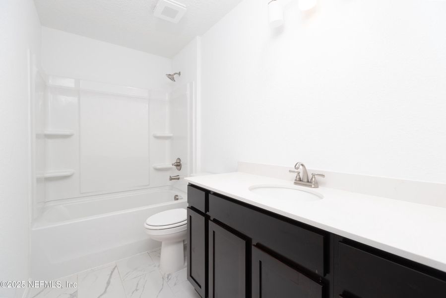 Furnished interior view inside a new home in , St. Augustine (Image 10).