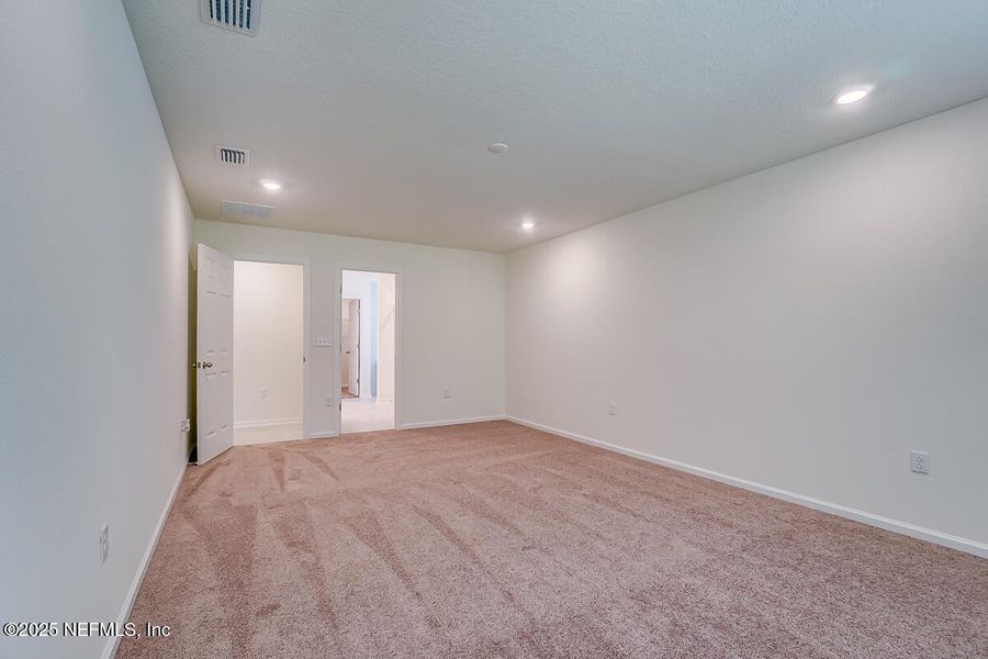 Spacious, unfurnished interior of a new home in Anabelle Island - Classic Series, Green Cove Springs (Image 12).