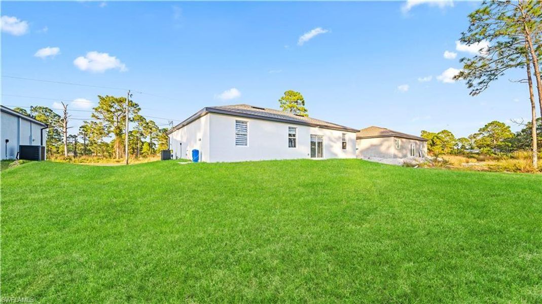Exterior details and patio area of a home in , Lehigh Acres (Image 30).
