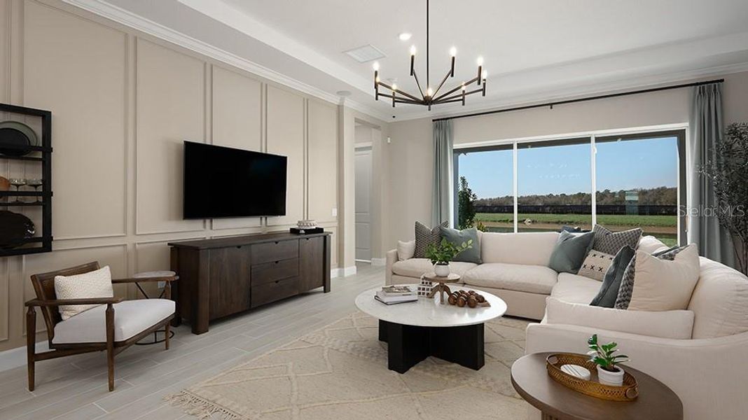 Furnished interior view inside a new home in Esplanade at McKinnon Groves, Winter Garden (Image 3).