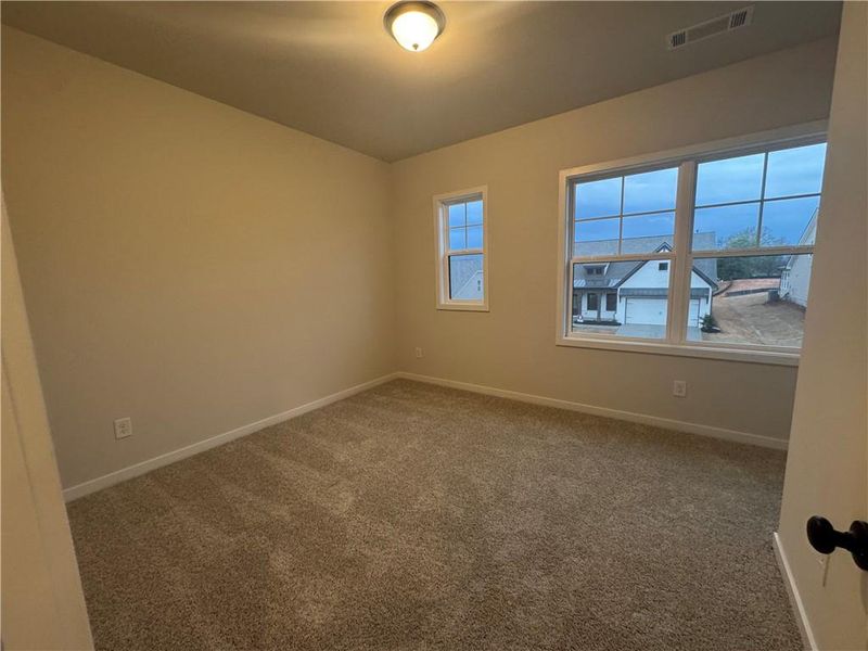 Spacious, unfurnished interior of a new home in Rosewood Lake Preserve, Hoschton (Image 15).