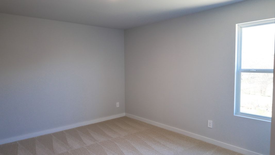 Representative unfurnished interior of a home built from the TISDALE by D.R. Horton in Harvest Point, Spring Hill (Image 50).
