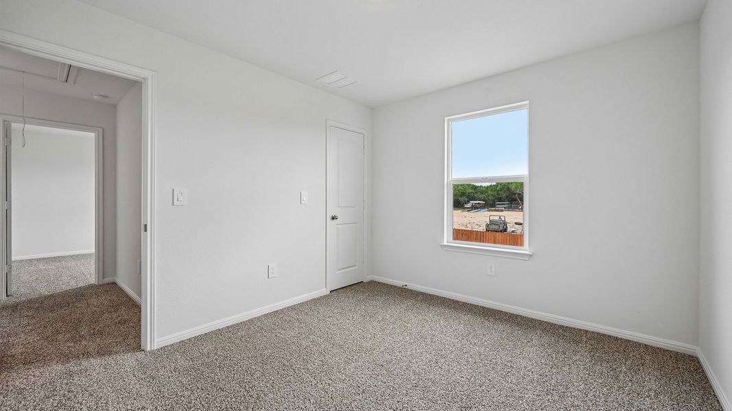 Spacious, unfurnished interior of a new home in Bar W Ranch, Leander (Image 44).