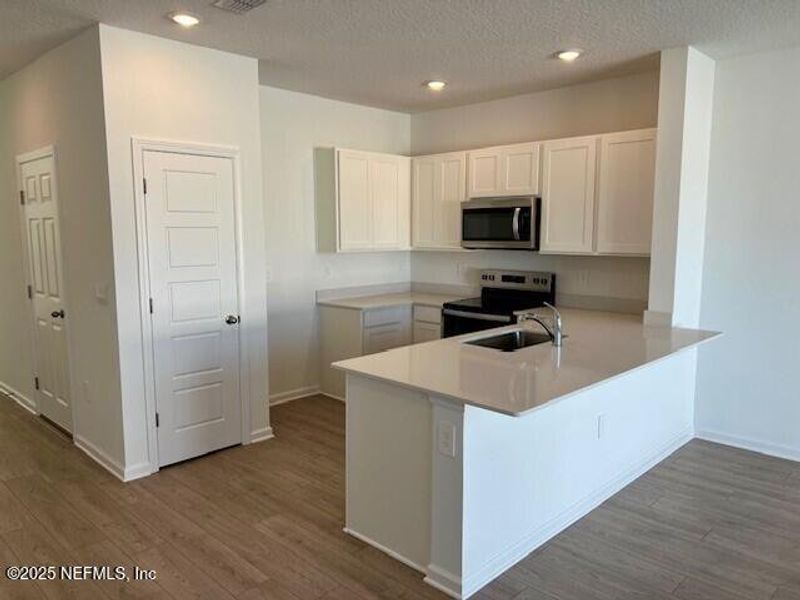 Furnished interior view inside a new home in The Landing, Middleburg (Image 16).
